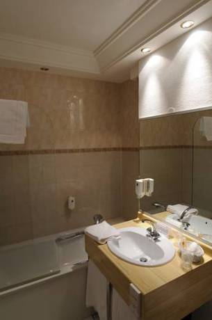 Imagen de la habitación del Hotel Le Roma. Foto 13