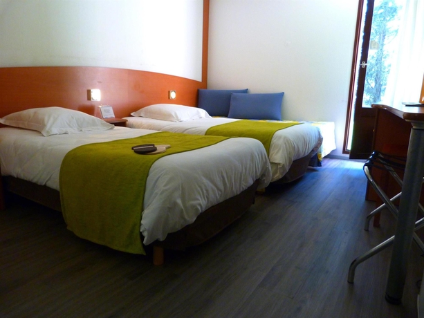 Imagen de la habitación del Hotel Le Roxane. Foto 12