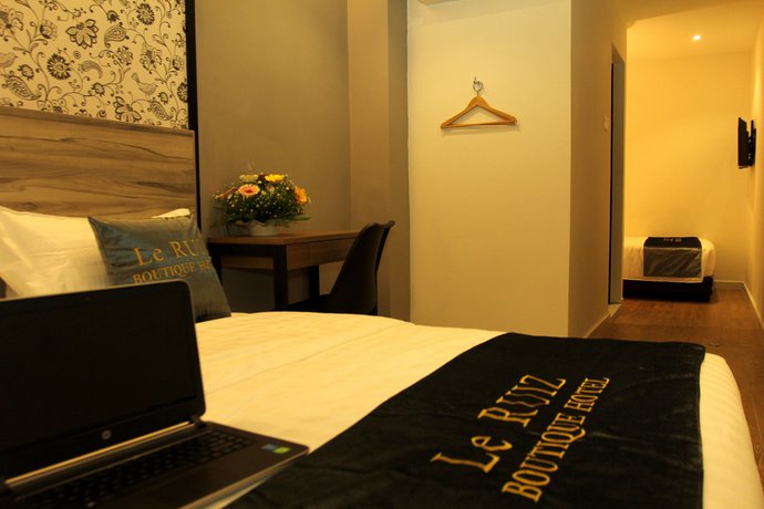 Imagen de la habitación del Hotel Le Ruiz Boutique. Foto 7