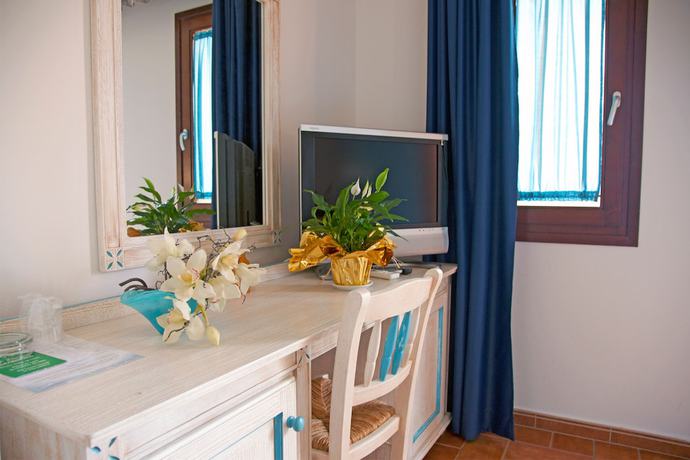 Imagen de la habitación del Hotel Le Sabbie Calasetta. Foto 6