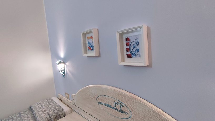 Imagen de la habitación del Hotel Le Sabbie Calasetta. Foto 11