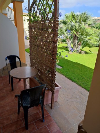 Imagen de la habitación del Hotel Le Sabbie Calasetta. Foto 15