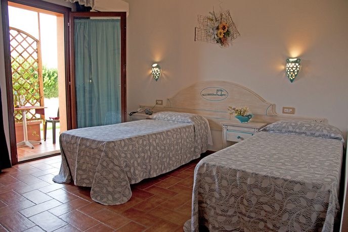 Imagen de la habitación del Hotel Le Sabbie Calasetta. Foto 20