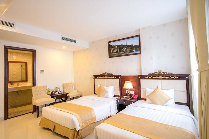 Imagen de la habitación del Hotel Le Saigon. Foto 12