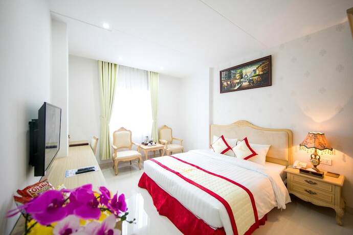 Imagen de la habitación del Hotel Le Saigon. Foto 13