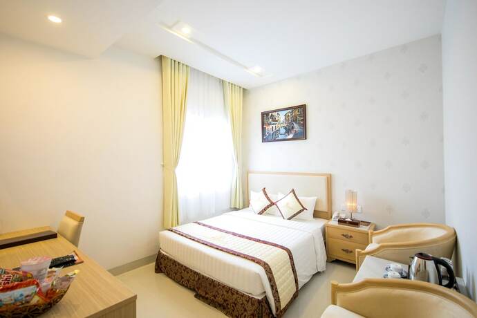 Imagen de la habitación del Hotel Le Saigon. Foto 14