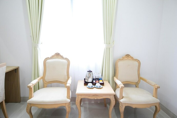 Imagen de la habitación del Hotel Le Saigon. Foto 16