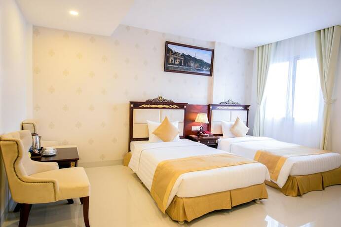 Imagen de la habitación del Hotel Le Saigon. Foto 17