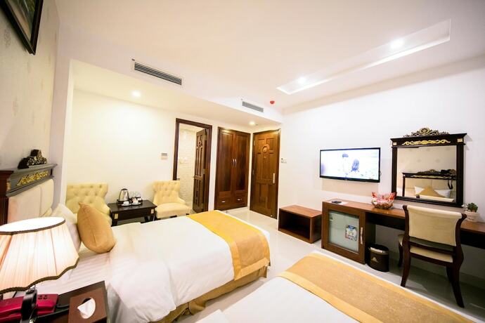 Imagen de la habitación del Hotel Le Saigon. Foto 18