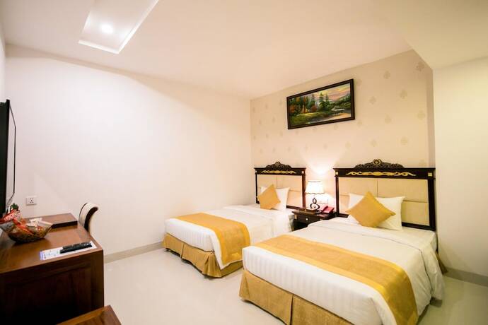 Imagen de la habitación del Hotel Le Saigon. Foto 22