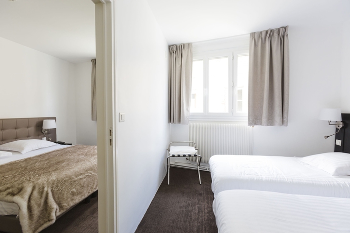 Imagen de la habitación del Hotel Le Saint Louis. Foto 2