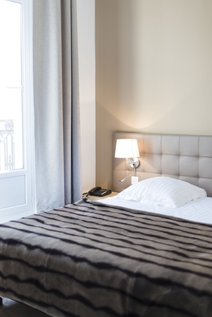 Imagen de la habitación del Hotel Le Saint Louis. Foto 3