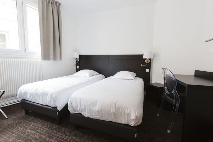 Imagen de la habitación del Hotel Le Saint Louis. Foto 6