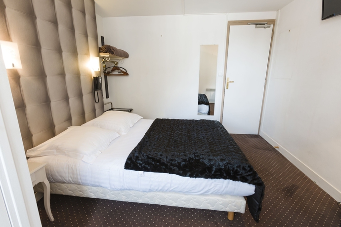 Imagen de la habitación del Hotel Le Saint Louis. Foto 10