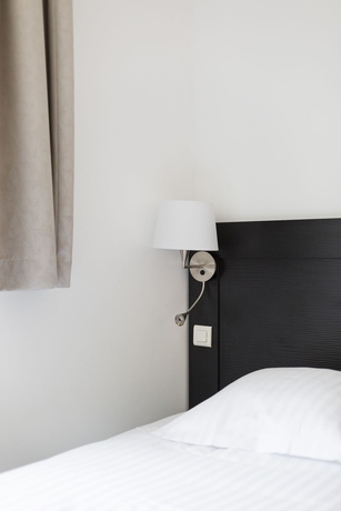 Imagen de la habitación del Hotel Le Saint Louis. Foto 12