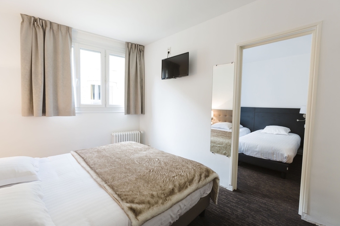 Imagen de la habitación del Hotel Le Saint Louis. Foto 17