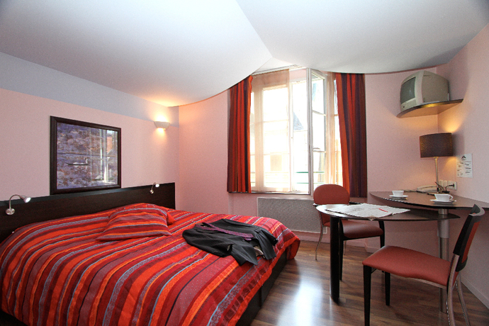 Imagen de la habitación del Hotel Le Saint-georges Vendome. Foto 5