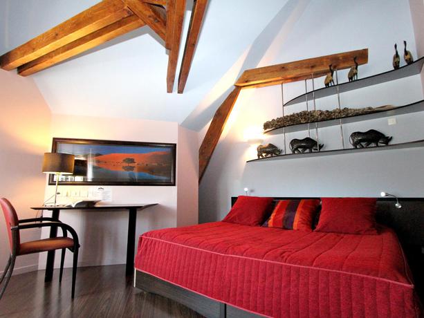 Imagen de la habitación del Hotel Le Saint-georges Vendome. Foto 6