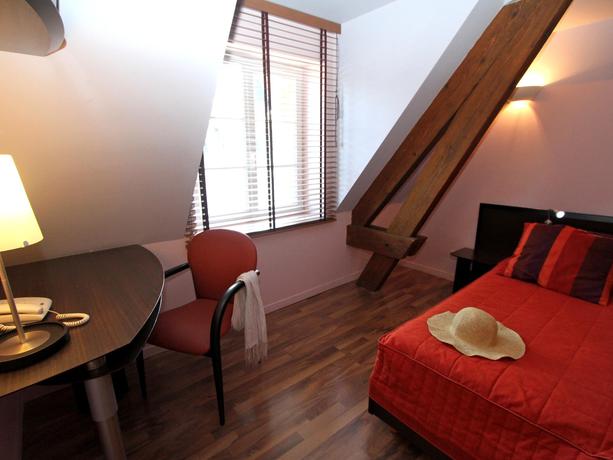 Imagen de la habitación del Hotel Le Saint-georges Vendome. Foto 8