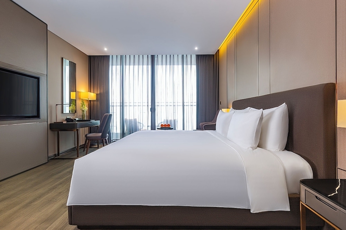 Imagen de la habitación del Hotel Le Sands Oceanfront Danang. Foto 10