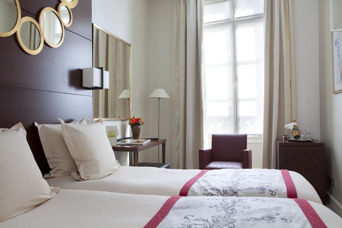 Imagen de la habitación del Hotel Le Senat. Foto 8