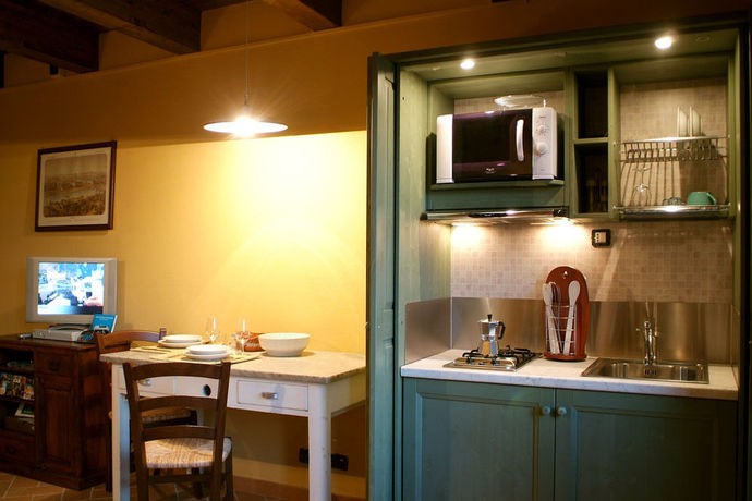 Imagen de la habitación del Hotel Le Serre Suites and Apartments. Foto 8