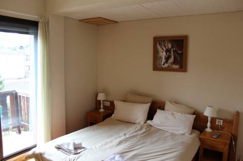 Imagen de la habitación del Hotel Le Sherpa, Les Deux Alpes. Foto 9