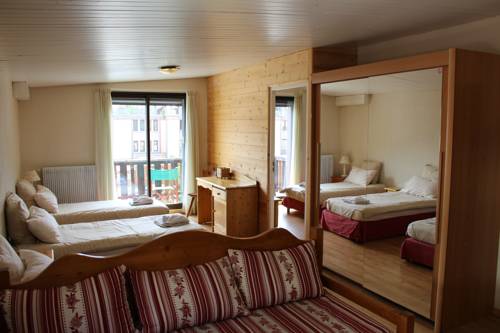 Imagen de la habitación del Hotel Le Sherpa, Les Deux Alpes. Foto 10