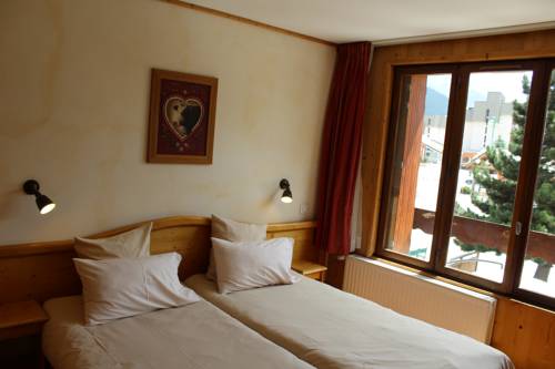 Imagen de la habitación del Hotel Le Sherpa, Les Deux Alpes. Foto 11