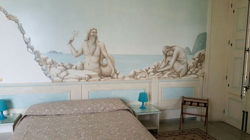 Imagen de la habitación del Hotel Le Sirene Scilla. Foto 18