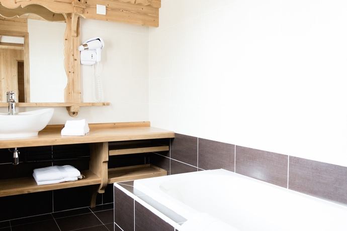Imagen de la habitación del Hotel Le Sporting, Morzine. Foto 11