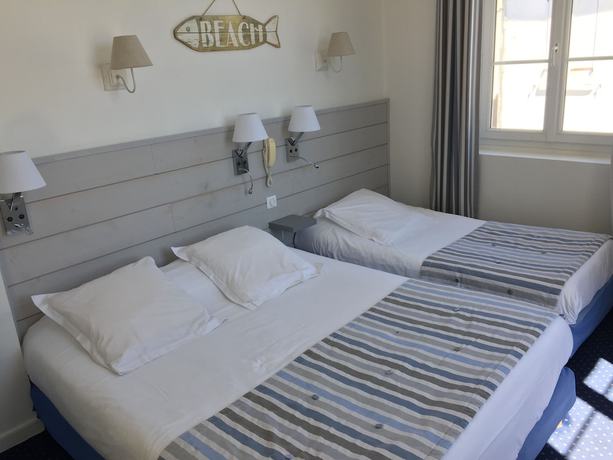 Imagen de la habitación del Hotel Le Square. Foto 4