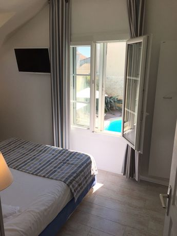 Imagen de la habitación del Hotel Le Square. Foto 5