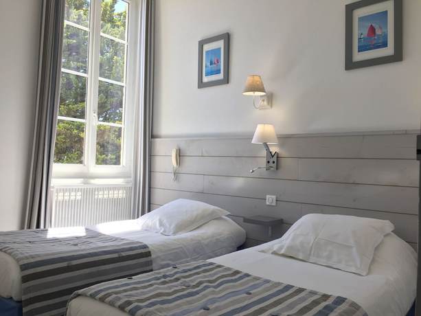 Imagen de la habitación del Hotel Le Square. Foto 6