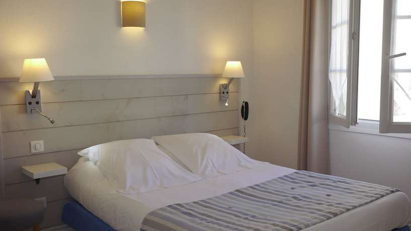 Imagen de la habitación del Hotel Le Square. Foto 7