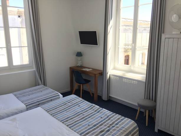 Imagen de la habitación del Hotel Le Square. Foto 9
