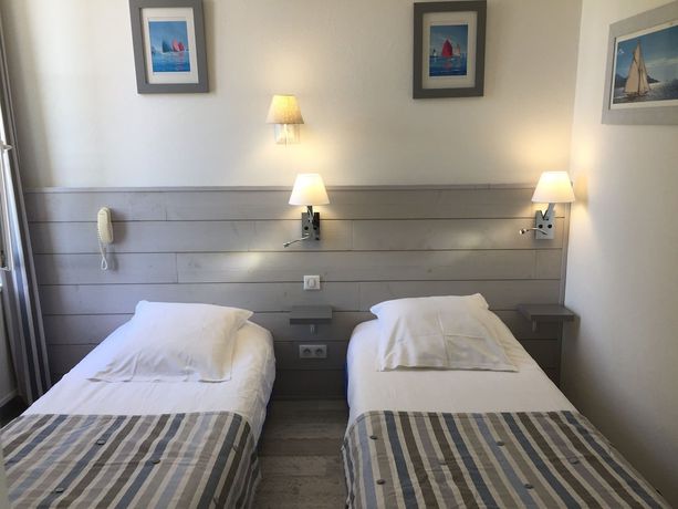 Imagen de la habitación del Hotel Le Square. Foto 10