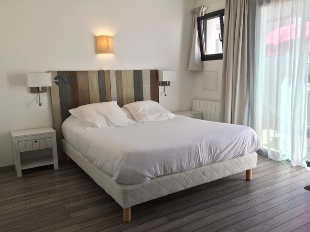 Imagen de la habitación del Hotel Le Square. Foto 11