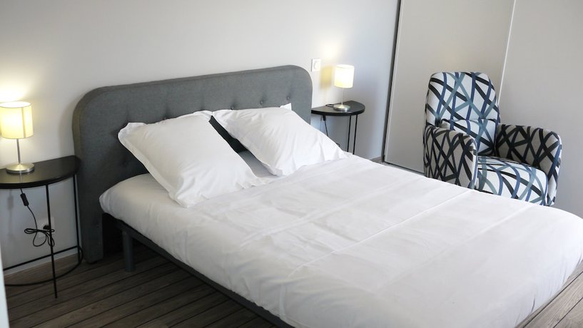 Imagen de la habitación del Hotel Le Square. Foto 18