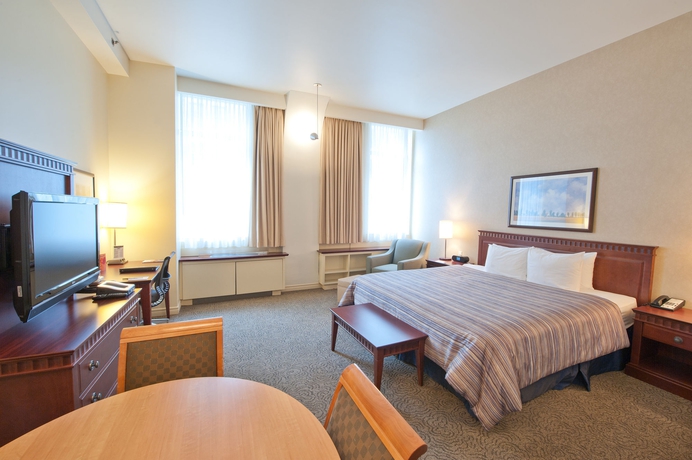 Imagen de la habitación del Hotel Le Square Phillips and Suites. Foto 7