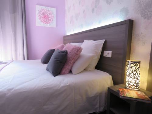 Imagen de la habitación del Hotel Le St Patrice. Foto 7