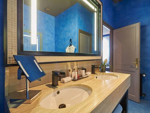 Imagen de la habitación del Hotel Le Stelsia Resort. Foto 7