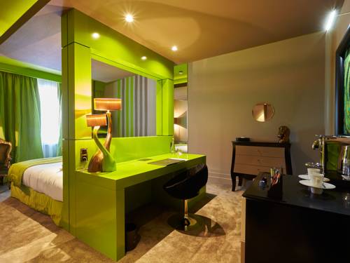 Imagen de la habitación del Hotel Le Stelsia Resort. Foto 8