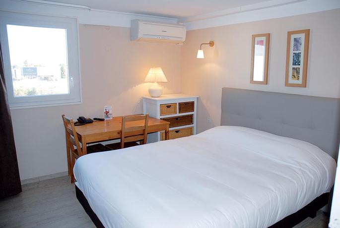 Imagen de la habitación del Hotel Le Sud, MAUGUIO. Foto 8