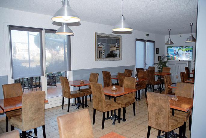 Imagen del bar/restaurante del Hotel Le Sud, MAUGUIO. Foto 6