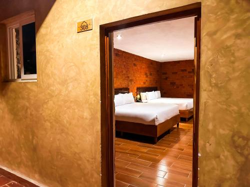 Imagen de la habitación del Hotel Le Suisse Spa. Foto 7