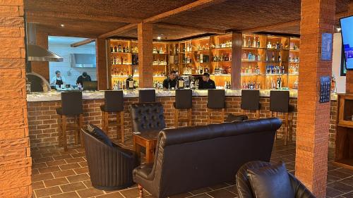 Imagen del bar/restaurante del Hotel Le Suisse Spa. Foto 3