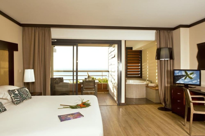 Imagen de la habitación del Hotel Le Tahiti By Pearl Resorts. Foto 4