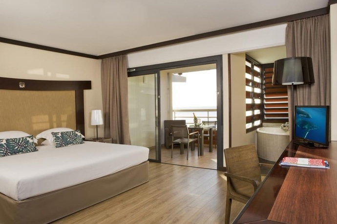 Imagen de la habitación del Hotel Le Tahiti By Pearl Resorts. Foto 7