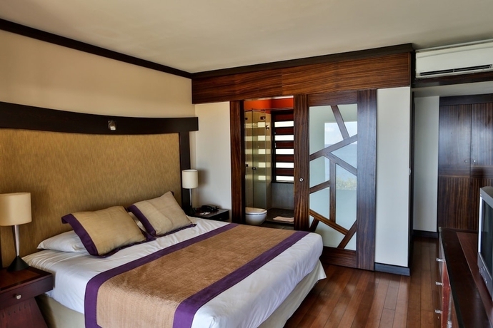 Imagen de la habitación del Hotel Le Tahiti By Pearl Resorts. Foto 13